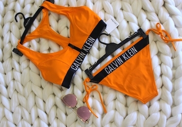 Calvin Klein Plavky Cheeky String Side Oranžové Spodní Díl
